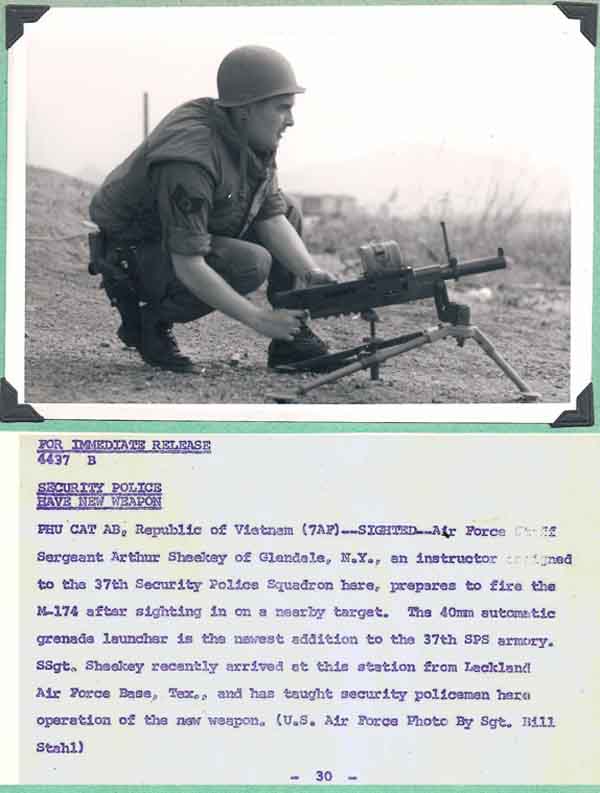 11. Phu Cat AB, Immediate News Release: 37th SPS, Instructor Sergeant Arthur Sheekey Manns prepares to fire the M-174 auto grenade launcher weapon. Photo by Don Bishop. 1969-1970.