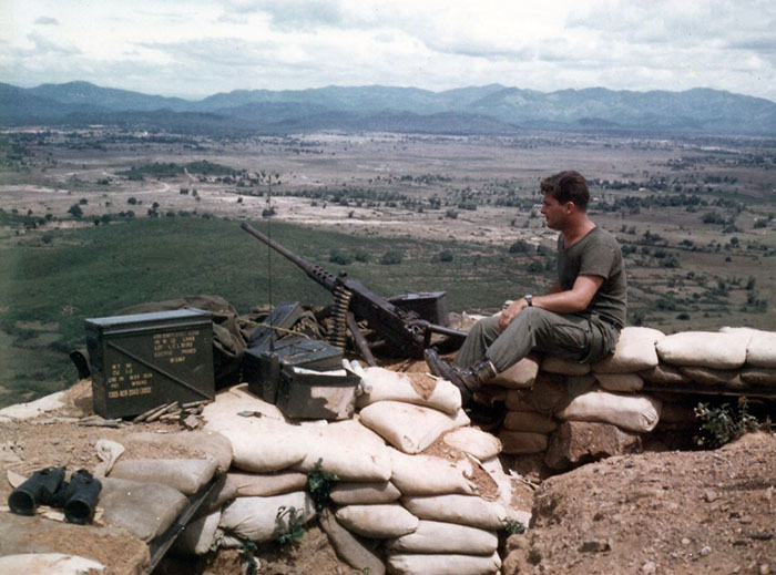 11. Phu Cat Air Base: Post 151, Doug Davis with .50 Cal, in the afternoon. Photo by: Doug D. Davis, 1968.