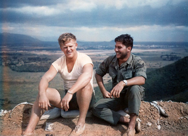 13. Phu Cat Air Base: Post 151, Nordburg and Doug Davis take a break. Phu Cat AB in background-center. Photo by: Doug D. Davis, 1968.