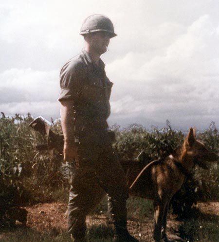 26. Phu Cat Air Base: Doug Davis and K-9 Smoke. Photo by: Doug D. Davis, 1968.