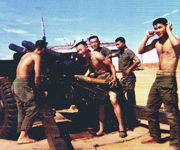 11. Phu Cat Air Base: Sgt Meek and ROK Stumpy, 105mm Howitizer. 1970-1971. 