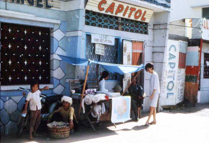 Phuoc Le market. Kid-peddlers and young lady shopping. MSgt Summerfield, 1969: 07