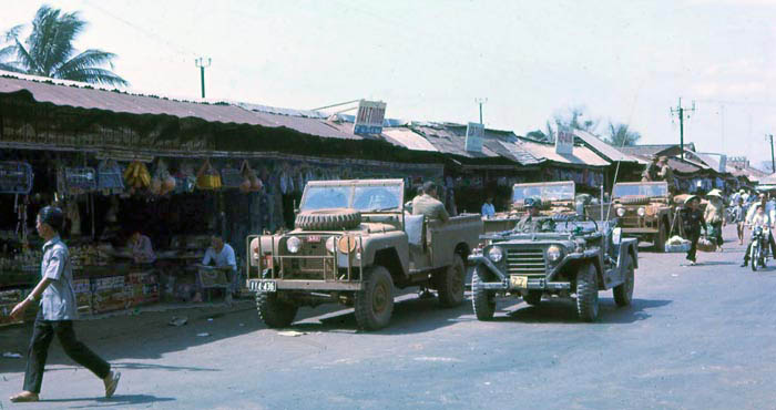 Phuoc Le market. USAF jeep with MSgt Summerfield, 1969: 05