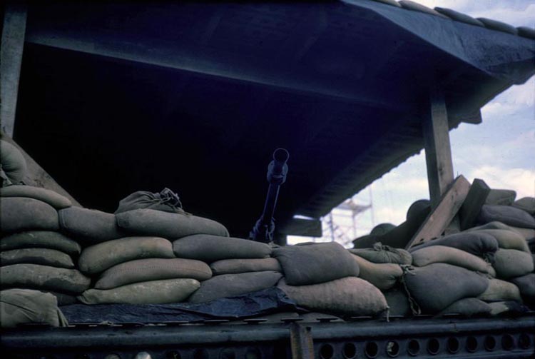 9. Phan Rang Air Base: Bunker with business-end of a 50.cal commanding attention.