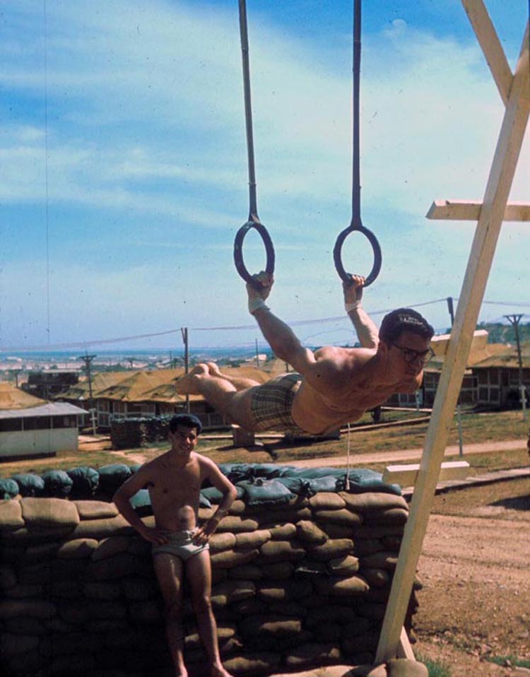 27. Phan Rang Air Base: Airman Fisher on the Rings of the Gym he built, and an extension to the Tent-Hut.