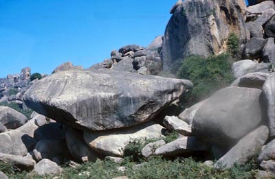 75. Phan Rang: Buddhist homes. Giant boulders.