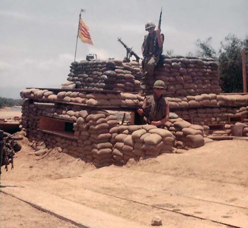 4. Phan Rang AB: Waterpoint Bunker, Outside of Base. M-50. Photo by Dana Anthony, 1968-1969. Note the USA Flag fluttering ontop of the South Vietnam flag!