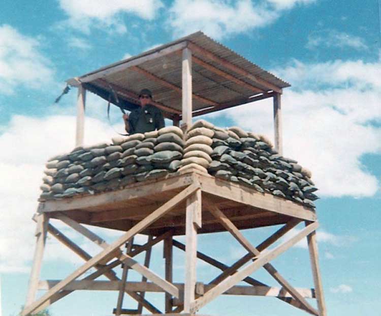 5. Phan Rang Air Base: OP-3, Van Digby standing guard with XM-148. Photo by: Van Digby, 1967-1968