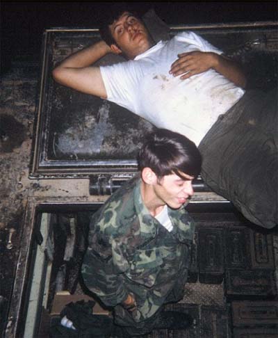 2. Phan Rang Air Base: Joe Taragowski, HW, preparing Bazooka Rounds (Yes, it's the old steel bazooka!). 1970. Photo by:Joe Taragowski, PR, 35th SPS, 1970.