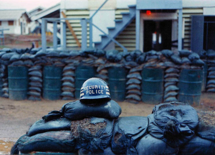 22. Phan Rang AB: 35th SPS Barracks. SP Helmet on sandbags. Just a not too fond memory: Tents and Tent-Huts, Hooches.