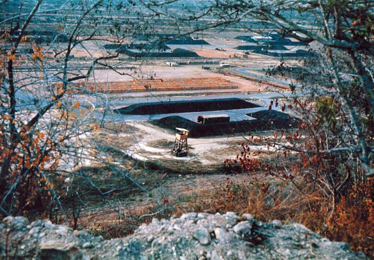 13. Phan Rang AB: Closer view of Bomb Dump and SP Tower, as viewed from hill.