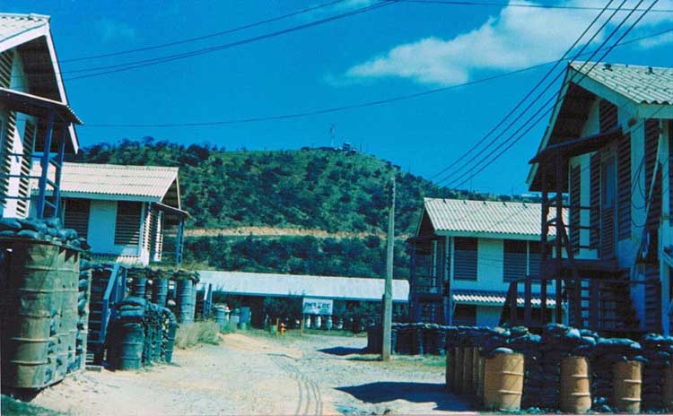 54. Phan Rang AB: Barracks, with Nui Dat Hill in background.