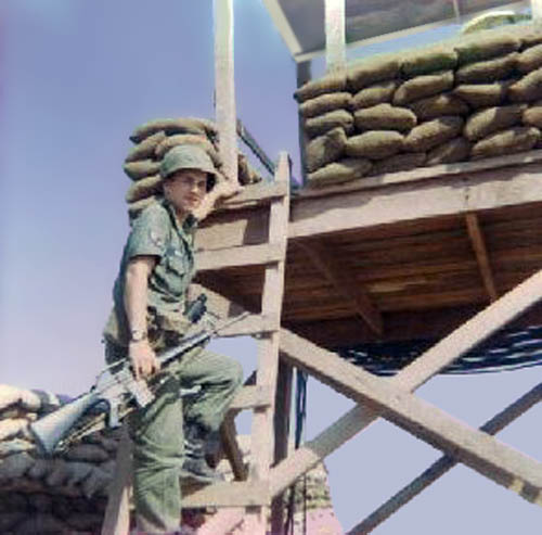 Photo: Terry Morris standing on Tower OP-1 ladder. 1966-1967.