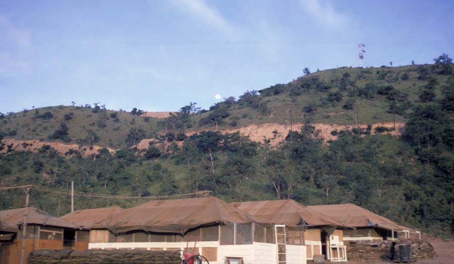 1. Phan Rang Air Base: Nui Dat Hill, 366th APS: Tent-Huts with Nui Dat hill in background.