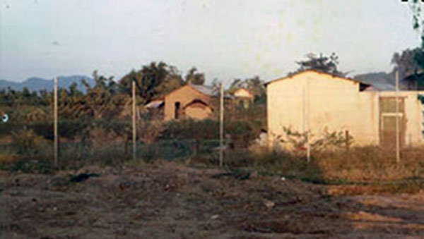 14. Phan Rang Air Base: Road to town and Vietnamese housing. Dusk. Photo by Gary Phillips. c1966.