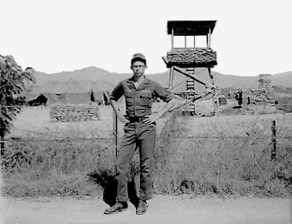 16. Phan Rang Air Base: Flighline and Perimeter Towers (2nd toweer, center-right) Bunkers, and tents. 1966-1967. Photo by: Robert Claud, PR, 35th SPS, 1966-1967.