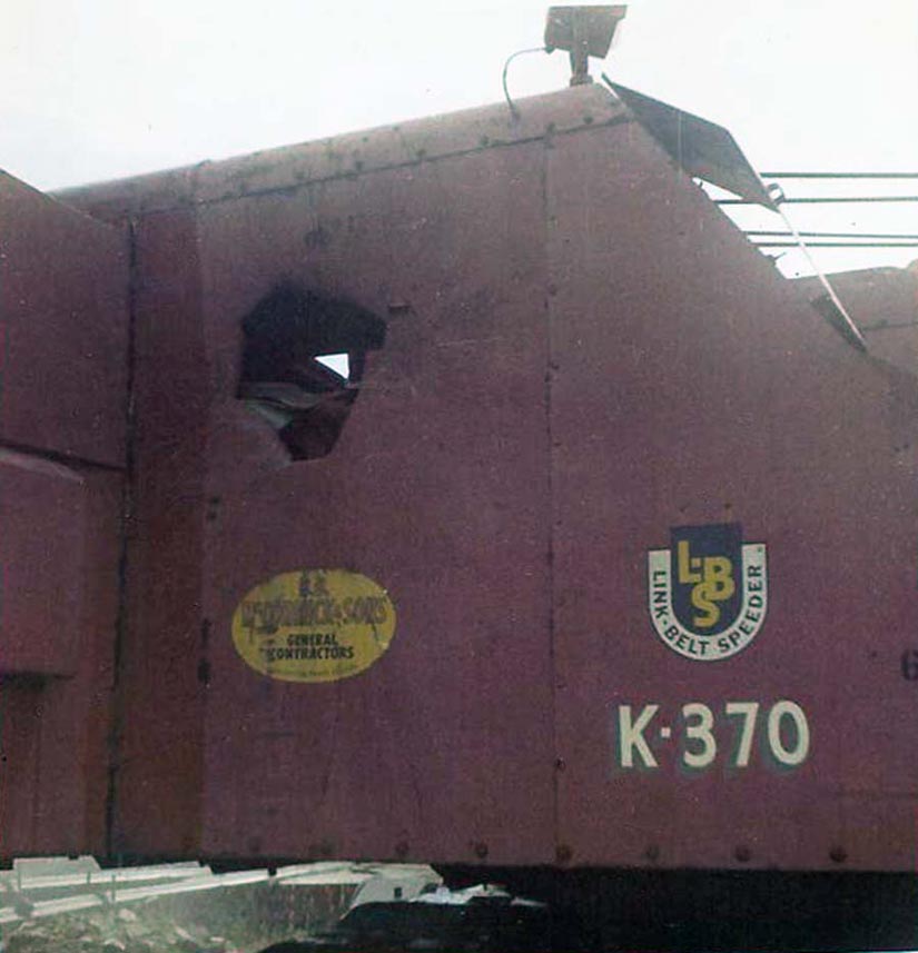 8. Phan Rang AB: Waterpoint Bunker, Outside of Base. Shrapnel punctures in side of crane. Photo by Dana Anthony, 1968-1969.