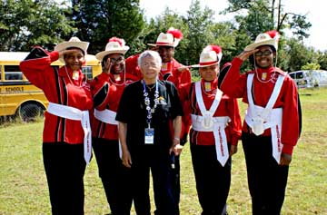 (110c.) Newell Swartz, prior VSPA president, and Mom, enjoy the JROTC's friendly spirit.