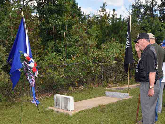 (91) Jim Willis renders hand salute. The sound of a warm breeze sweeps through treetops.