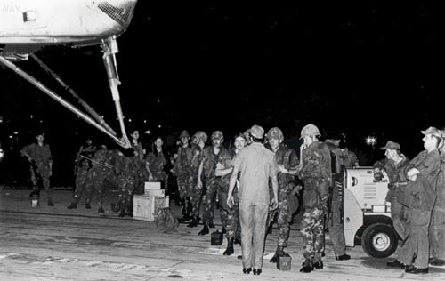 USAF 56th Security Police await boarding helicopter.