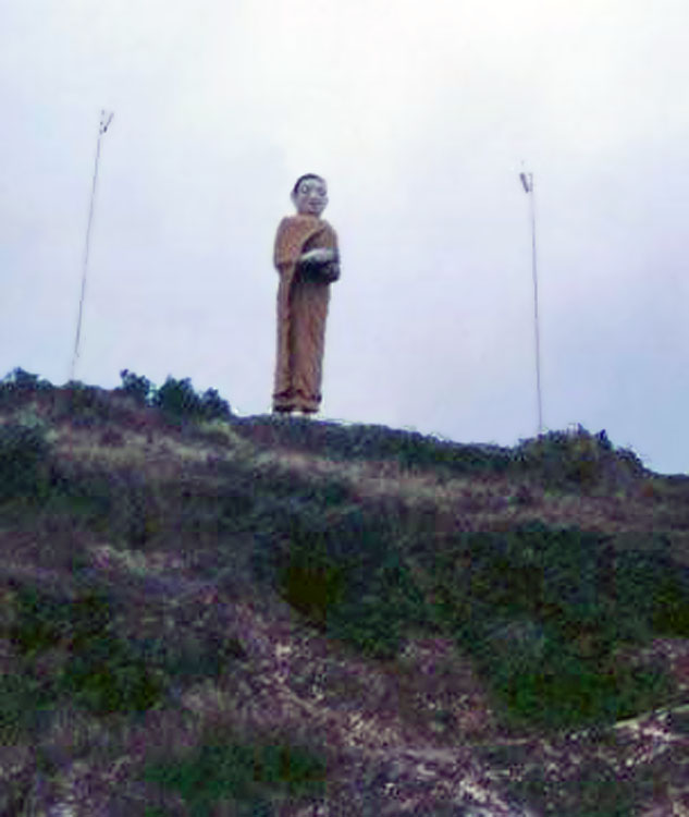 11. Mike Douglas had related that he saw a standing Buddha on his was to Tan My. Here is a picture of a standing Buddha near Huế City. You can see that there are light poles near the Buddha so that he can bel seen at night.