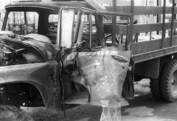 Ton & Half Air Police Truck, battle damaged, 4 Dec 1966. Photo by: Bill Trimble.