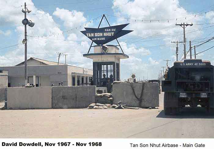 7. Tan Son Nhut AB, Main Gate with concrete barriors. Photo by: David Dowdell, LM 144, TSN, 377th SPS; DET-1/621st TCS/SP VT. 1967-1968.