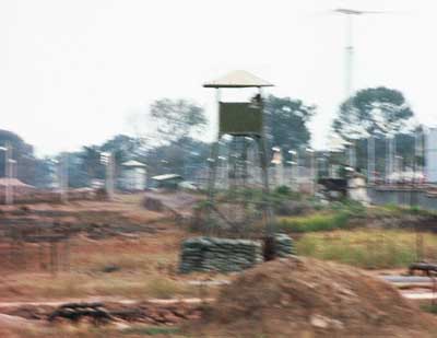 15. Tan Son Nhut Air Base: Tower-16 and Bunker overlook minefield (See photo 13 above). 1969. Photo by: Don Segraves, TSN, 377th SPS. 1969-1970.