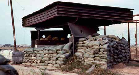 17. Tan Son Nhut Air Base: Bunker BB7: Right side of bunker. Extra ammo can and cleaning supplies were chained up in a transfer case in the rear of the bunker.