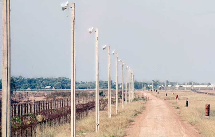 23. Tan Son Nhut Air Base: Bunker: vPerimeter Road. Minefield and Floodlights to Left.