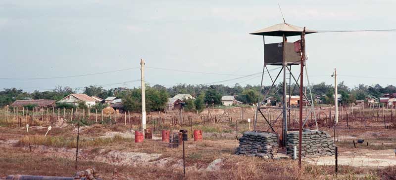 14. Tan Son Nhut Air Base: Tower-16 and Bunker overlook minefield and village. Photo by: Don Segraves, TSN, 377th SPS. 1969-1970.