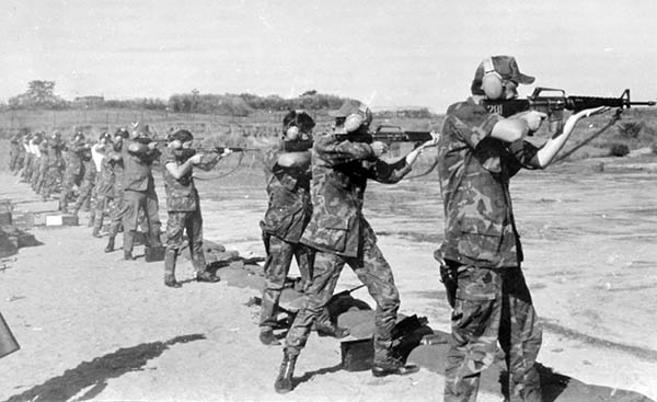 12. TSN Air Base: Once while I was at Tan Son Nhut AB we traveled to Biên Hòa AB for weapons qualification. These photos were taken going to Biên Hòa and at their range. And no we did not have that many left handed shoters. They printed the picture backwards and I can't find the negatives to correct it. [corrected/Don Poss]