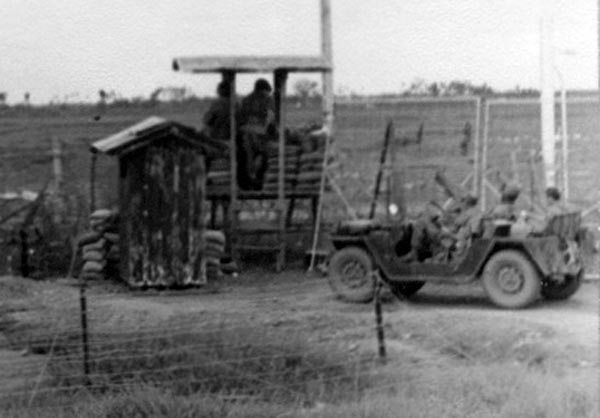 8b. Tan Son Nhut AB, O-51 Gate and Jeep. Closeup. Photo by: James A. Stewart, LM 60, TSN, 377th SPS K9. 1967-1968.