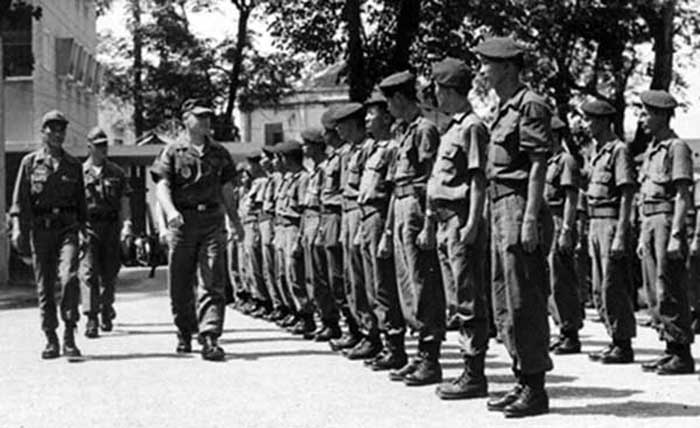 2. Lt. Duncan, SSgt Charles Hyde inspecting Nung Guards. Photo by Kailey Wong, 1967-1968.