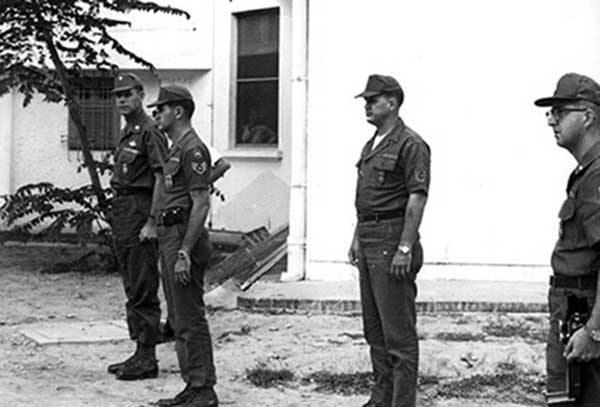 3. L to R: Lt. Col. Roger Benton, SSgt Thomas Holderness, TSgt Bobby ----; 1st Lt. R. Plantz. Photo by Kailey Wong, 1967-1968.