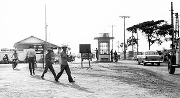 2a. Tan Son Nhut AB, Main Gate. 1965. Photographer: Martin. (first name?)