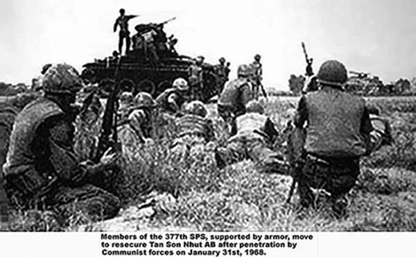 3. Tan Son Nhut AB, Bunkers and defense. 1968. Members of the 377th, supported by armor, move to resecure TSN AB after penetration by Communist forces on Jan 31, 1968. Photo by: unknown.