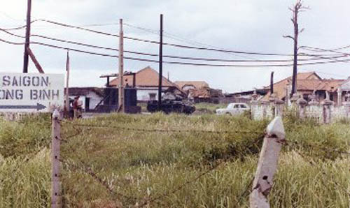 11a. Tan Son Nhut AB Gate: Saigon-Long Binh Entrance/Exit. Photo by: Randy M. Snyder. 1972-1973.