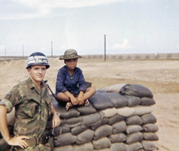 4. Tuy Hoa AB, Bunker. Henry, with visitor Vietnamese boy. Photo by: Henry Lesher, 1968-1969.