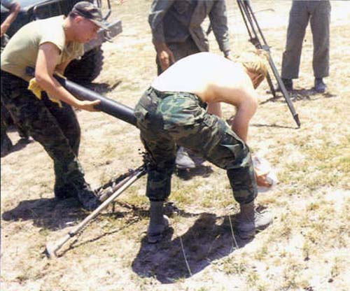 4. Ubon RTAFB. Clearing hung-fire in an 81mm Mortar. L/R: Willie Squires, Wiseman. 1971-1972. Photo by: Everett (Willie) Squires,UB, 8th SPS, HW, 1971-1972.