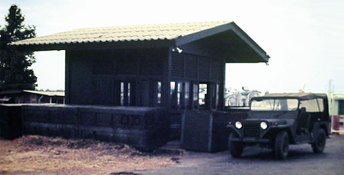 8. Ubon RTAFB. Gate and jeep. Photographer: Richard Matott, LM 307, UB, 8th SPS K9, 1973-1974.