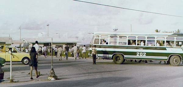 7. U-Tapao RTAFB, Main Gate: Baht Bus leaving the parking lot at U-Tapao main gate. Photo by: Roderick K. Duncan.