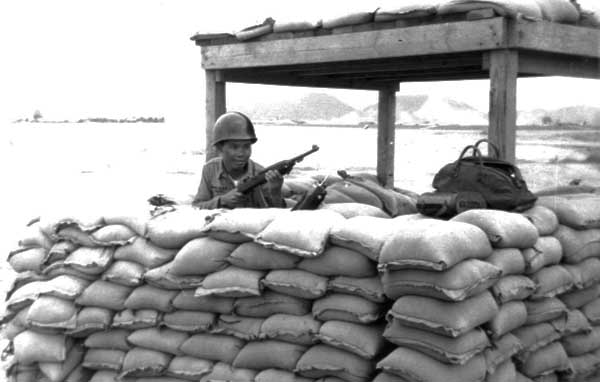13. U-Tapao RTAFB, Bunker, Thai Guard. 1968. Photo by: William Bever, UT, 635th SPS, 1968.